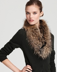 Embellish an ensemble or your favorite jacket with this statement-making fur scarf.