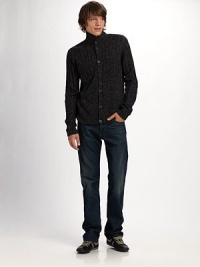 A new-look sweater for downtown guys, shaped with wide ribbing and a unique buttonfront. Leather elbow patches and placket trim add smart tonal detail. Buttonfront Chest patch pockets Leather elbow patches and placket trim 50% acrylic/30% wool/20% linen Dry clean Imported 