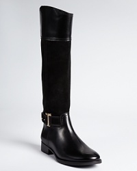 Tory Burch goes riding with the Tenley boots, an equestrian style that mixes soft suede with luxe leather.