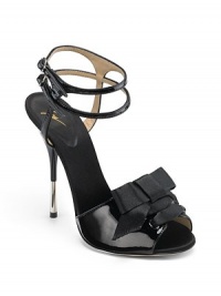 THE LOOKLace-up satin bow detailDouble ankle straps with buckle closuresMetal-tipped heelTHE FITHeel 4½ (115mm)THE MATERIALPatent leather & satin upperMetal heelLeather lining and soleORIGINMade in Italy