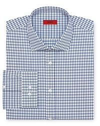 Modernize your dress shirting with this tonal check design from HUGO, crafted in crisp cotton and tailored for a contemporary fit.