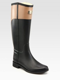 Waterproof classic in an equestrian-inspired, two-tone design. Rubber heel, 1 (25mm)Shaft, 15Leg circumference, 14Rubber upperPull-on styleJersey liningRubber solePadded insoleImported