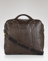 Stow a change of clothes and that novel you've been itching to read inside this refined leather holdall, designed with a subtle, stitched M on the exterior for a signature designer touch, perfect for a trip out of town. From MARC BY MARC JACOBS.