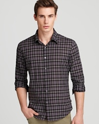 A sharp button-down from John Varvatos USA strengthens your appearance and makes an effortless complement to your denim wardrobe. Crafted in fine cotton for comfort.