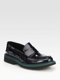 Leather penny loafer design with colored micro detail.Leather upperLeather liningRubber soleMade in Italy