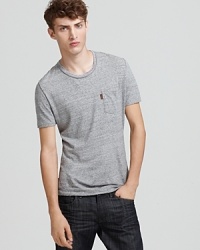 Go back to basics with Burberry--this classic casual tee offers timeless style and comfort.