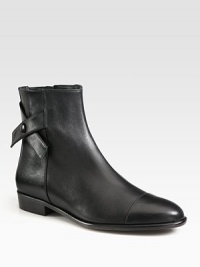 Criss-cross straps top this urban-cool ankle boot of rich leather, with detailed seaming and an easy side zip. Stacked heel, 1 (25mm)Leather upperSnap closure and side zipLeather lining and solePadded insoleImported