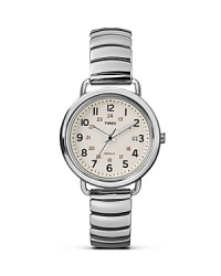 Inspired by functional, industrial style, this off-white watch from Timex has a minimalist design, punctuated by a sleek stainless steel bracelet.