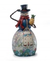 Collectors will adore this Snowman figurine with its signature Jim Shore details that evoke America of a bygone era. History buffs will appreciate the use of the pineapple, a holiday motif first popularized in Colonial Williamsburg.