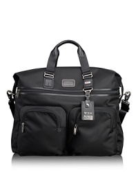 Rendered in ballistic nylon with leather trim, the Alpha Bravo series offers classic styling details and strong organizational pockets, functioning seamlessly across work, travel and casual environments. With a roomy interior, the duffel easily packs your essentials for an overnight or weekend trip.