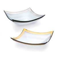 Ancient Italian relics are translated into an abstracted modern design in this handcrafted dinnerware and serving collection from designer Ann Morhauser. This handpainted, 24 karat gold collection tastefully accentuates everything from sleek, modern designs to delicate porcelain, or can be used on its own as a dramatic statement.