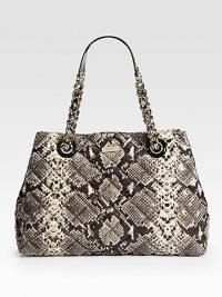 A quilted style in luxurious snake embossed leather with a chic chain strap.Double chain and snake embossed leather shoulder straps, 8½ dropMagnetic snap closureOne zip and two open inner compartmentsOne inside zip pocketTwo inside open pocketsJacquard lining15W X 11H X 5½DImported