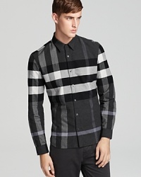 The iconic check print takes center stage in this chic sport shirt from Burberry Brit.