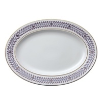 Inspired by the opulent parties of Louis XIV's Royal Court, Versace's Le Grand Divertissement collection is as ornate and luxurious as you'd expect from the Italian design house. The iconic Arabesque leaf design is rendered in lavender and gold against a classic white background with no attention to detail spared.