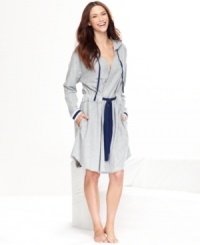 Stay cozy this season in this french terry robe by Tommy Hilfiger. It features contrasting trim along the sleeve edges and on the drawstring closures with pockets on both sides.