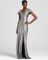 Transform yourself into a silver screen goddess with this stunning Alexis dress--dramatic, leg-baring front slits and allover metallic shine infuse this oscar-worthy look with incomparable glamour.