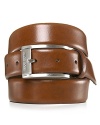 Sleek, brown dress belt with silvertone, brushed buckle. Hugo Boss engraved on buckle.