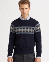 A modern style Nordic print pattern defines the body and shoulders of a cozy sweater knitted in superior wool.CrewneckRibbed knit collar, cuffs and hemWoolDry cleanImported