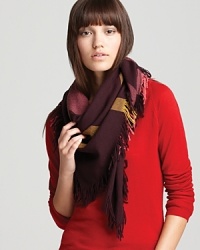 Rendered in extra fine wool, Burberry's oversized square scarf-with a burgundy, pink and yellow check-can be styled multiple ways for versatile wear.