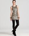 Tiger striped sequins energize this striking little Dolce Vita dress--unleash your natural animal instincts at the nextparty.