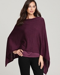 Transition into the new season by topping off your look with a lush layer. Rendered in decadent merino wool, this Eileen Fisher poncho touts a sumptuous silhouette for a luxe approach to laid-back style.