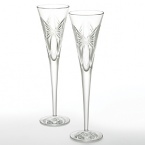 These special flutes say this pair belongs together. Representing the traditional gift giving of anniversaries, these beautiful flutes are adorned with celebratory bows. Your Waterford Crystal anniversary flutes celebrates both your past and your future, toasting to years shared together. Set of 2; 5 oz.