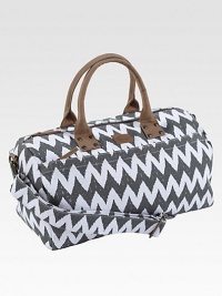 A bold zigzag pattern looks fresh and smart, printed on sturdy cotton and fashioned into a roomy duffel.Top zip closureLeather double handlesDetachable, adjustable shoulder strapInside and outside zip pockets18¾L X 9½H X 9¼DCottonSpot cleanImported