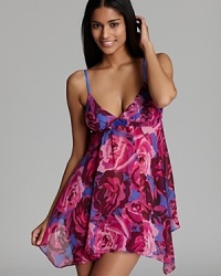 Be the belle of the bed in this sweet, floral chemise and matching thong from Betsey Johnson.