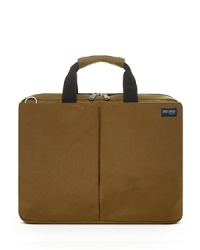 Jack Spade redefines armed forces with this handsome military brief, an inspired holdall that accommodates your workload in a thoroughly masculine design that's water- and abrasion-resistant.