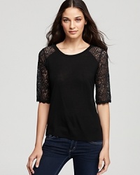 A ladylike front hides a sassy secret on this AG Adriano Goldschmied tee: a bold, sheer lace back shows off your slinky side.