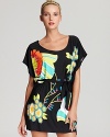 Lounge about in an elegant Trina Turk coverup tunic, highlighted with a pretty palette and graphic print.