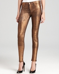 Rendered in metallic bronzed glory, these ultra-stretch J Brand jeans feel like your second skin and cast a glamorous new light on your denim repetoire.