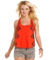 Do a double-take for Mallory: a two-layer tank from GUESS? that's trimmed in tribal graphics and saturated in bold hue!