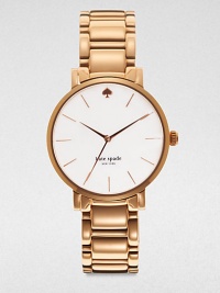 A sleek timepiece in a warm rose goldtone design. Quartz movementWater resistant to 3 ATMRound rose goldtone stainless steel case, 34mm (1.3)Smooth bezelWhite dialDash hour markersSecond hand Rose goldtone stainless steel link braceletImported