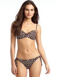 THE LOOKAllover leopard printPadded, underwire cupsAdjustable strapsBack claspTHE MATERIAL80% nylon/20% spandexFully linedCARE & ORIGINHand washMade in USAPlease note: Bikini bottom sold separately. 