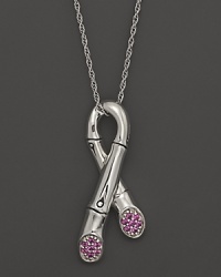 Sterling silver, joined like a bamboo stalk, forms a ribbon pendant with sparkling pink sapphire pavé at the ends. On an adjustable chain.