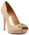 Silky elegance. Badgley Mischka's Goodie platform pumps feature the most beautiful rhinestone detail at the toe.