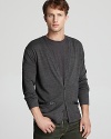 Call on this edgy cardigan when you need a lightweight layer for your night on the town.