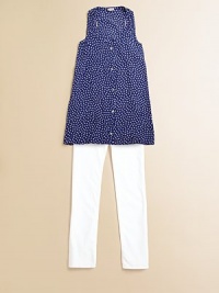 Pretty little polka dots add punch to a charming, cheery style.ScoopneckSleevelessButton frontRayonMachine washImported