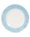 Sculpted blooms and a classic silhouette make the Toulouse dinner plates by Fitz and Floyd a charming part of any casual landscape. A rustic sky-blue glaze adds to its antique appeal.