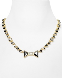 Girly with a bit of grit, this MARC BY MARC JACOBS necklace is fit to be tied, styled with a bow-shaped pendant.