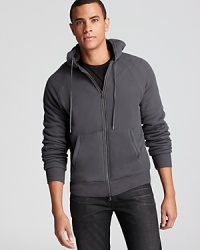 Furnished with fleece lining for an extra layer of warmth, this textural waffle hoodie feels good on both sides.