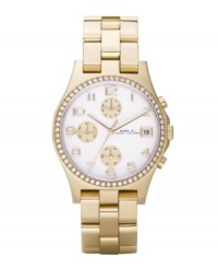 Feel like you're sitting in the lap of luxury with this indulgent Henry watch by Marc by Marc Jacobs. Gold ion-plated stainless steel bracelet and round case. Bezel embellished with crystal accents. White chronograph dial features applied goldtone numerals at markers, date window at three o'clock, three goldtone subdials, three hands and subtle logo. Quartz movement. Water resistant to 30 meters. Two-year limited warranty.