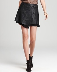 No woman should be without a chic leather mini in her closet--we suggest this Joie skirt--a natural-born stunner who's tame enough for the office but always up for a party.