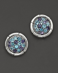 Sterling silver, jointed like a bamboo stalk, circles a glittering pavé lagoon of Swiss blue topaz and iolite gems.