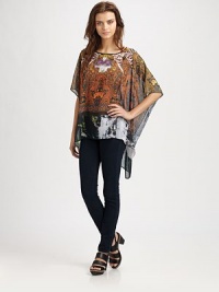 Slightly faded, paisley-printed top in a semi-sheer silhouette with three-quarter kimono sleeves and an asymmetrical hem that hits below the hips. BoatneckThree-quarter kimono sleevesAsymmetrical hem hits below the hipsPolyesterDry cleanMade in USA of imported fabricModel shown is 5'10 (177cm) wearing US size Small.