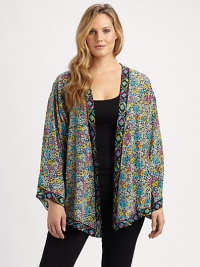 A duet of prints adds charming appeal to this silk shrug. Layer it over almost anything.Open-front designLong sleevesContrast trimAllover printPull-on styleAbout 27 from shoulder to hemSilkDry cleanImported