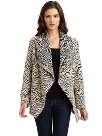 THE LOOKAllover jacquard woven construction with zebra printDraped flap collarOpen frontHandkerchief hemTHE FITAbout 28 from shoulder to hemTHE MATERIALWool/polyamide/polyesterCARE & ORIGINDry cleanImportedModel shown is 5'9½ (176cm) wearing US size Small. 