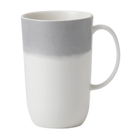 A watercolor wash of gradient gray migrates toward a warm neutral center to create an organic ombre effect on this durable, adaptable mug from Vera Wang.