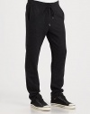 A refreshingly modern trackpant style, shaped in a blend of brushed wool and nylon, with the smart look and appeal of a casual trouser.Elastic drawstring waistSide slash pocketsFully linedInseam, about 3055% wool/45% nylonDry cleanImported